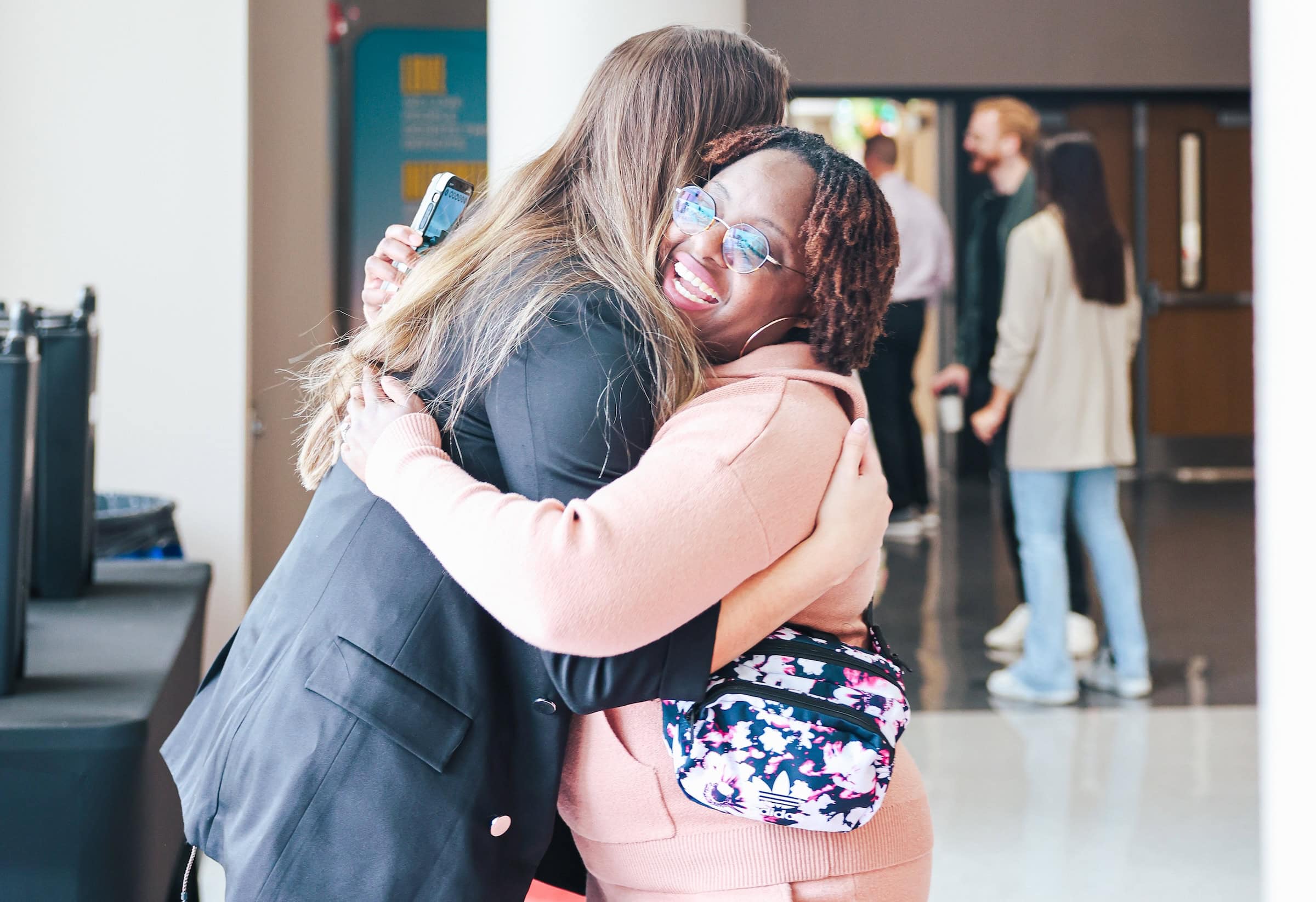 Friends embracing at LIIV