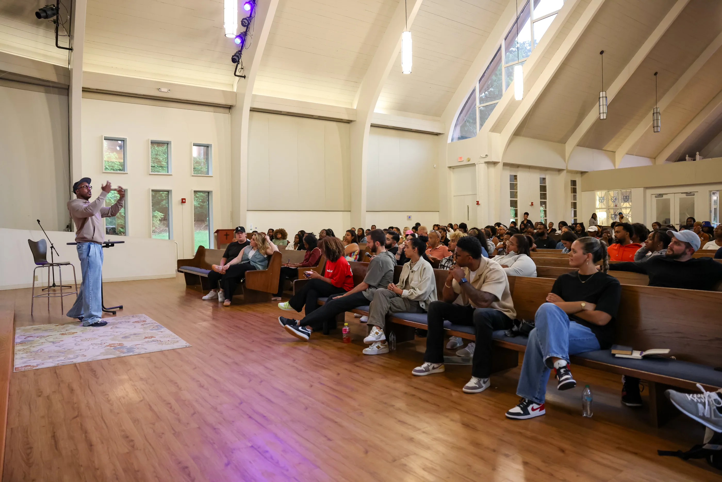 Pastor Mayo speaking to the LIIV community